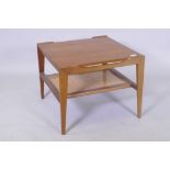 A mid century teak two tier occasional table with caned under tier, 60 x 60 x 49cm