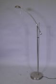 A brushed metal adjustable floor lamp, 145cm high