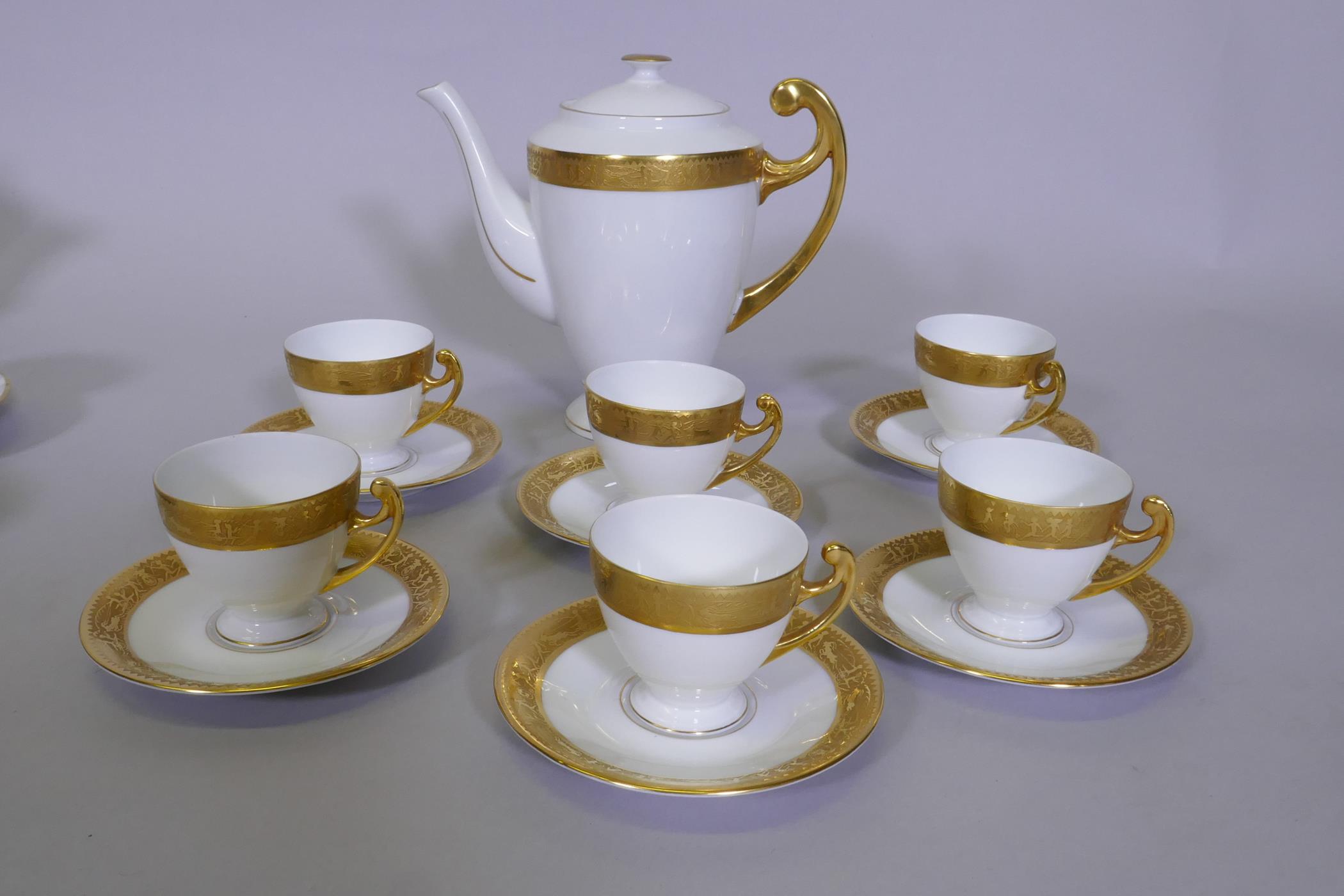 A Bohemian porcelain six place tea set with raised gilt borders, unused, and another with floral - Image 2 of 5