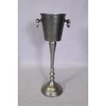 A cast metal Champagne bucket on stand, 74cm high