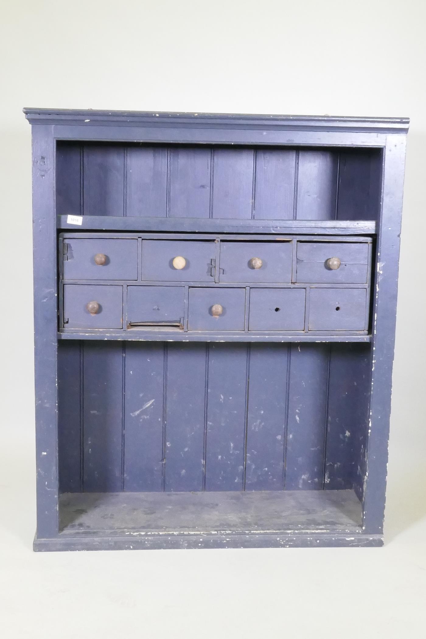 A painted pine open cabinet with an associated mahogany nest of drawers, 103cm x 39cm, 123cm high