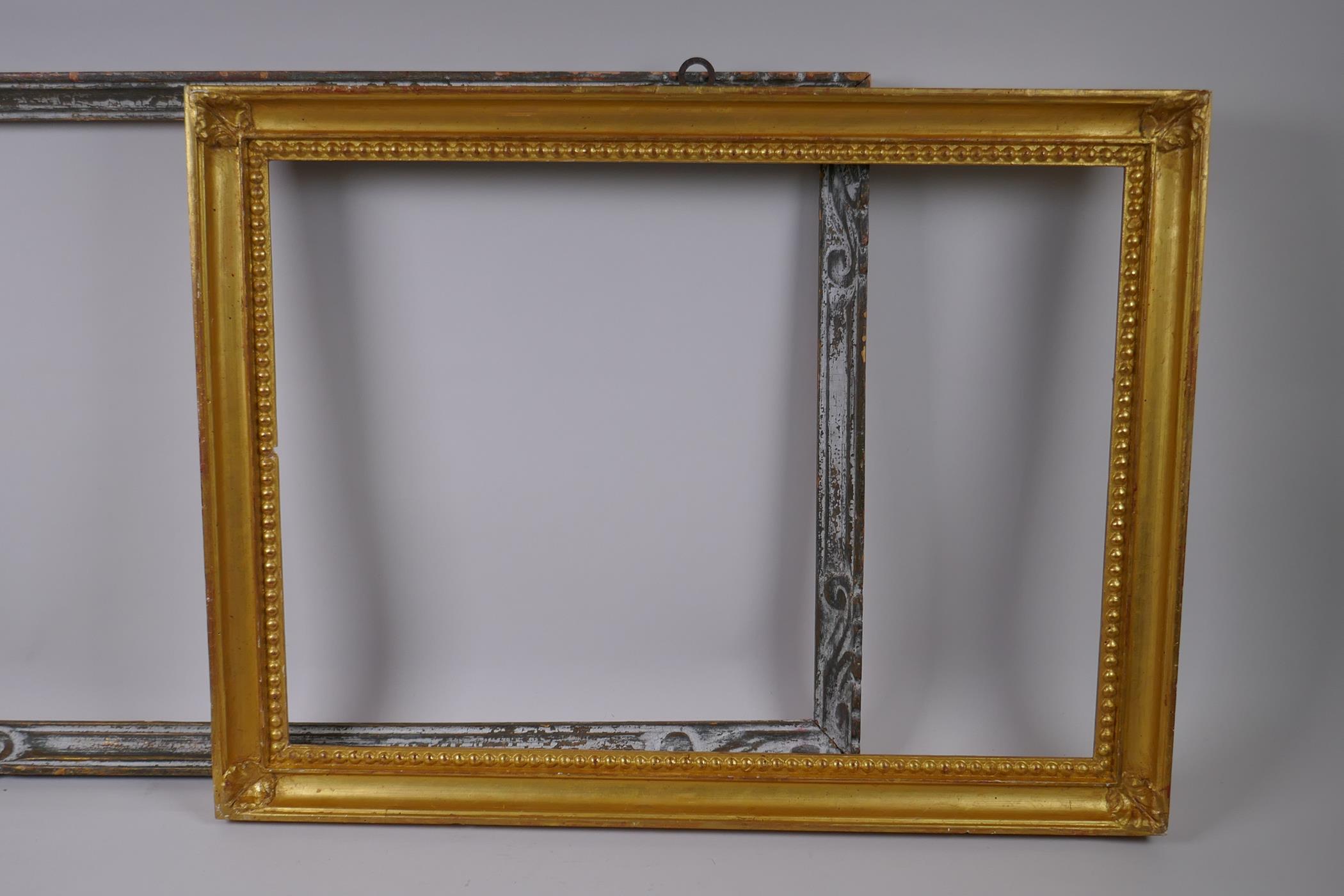 A giltwood picture frame, with bead and corner leaf decoration, and an early C20th carved wood - Image 2 of 3