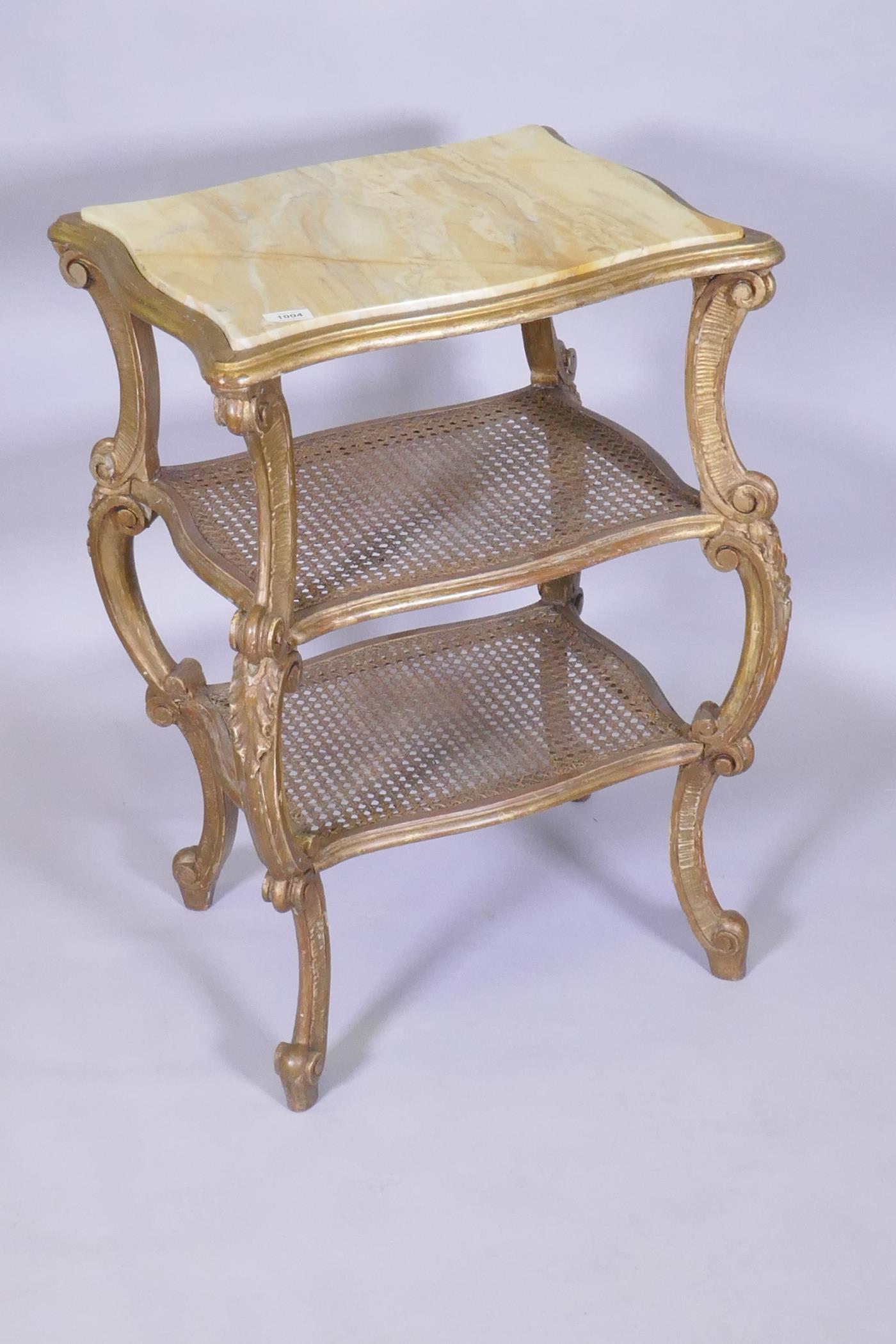 A C19th Italian giltwood three tier serpentine shaped etagere, with inset marble top and caned - Image 2 of 3