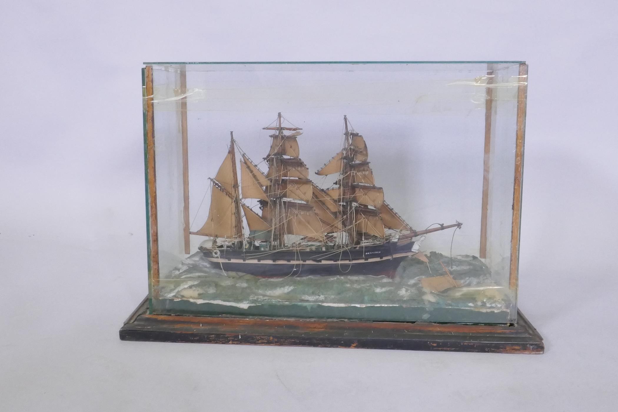 A model of a three masted sailing ship, Armitage in stormy seas, set in a diorama and glass case, AF - Image 4 of 4