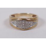 A 9ct yellow gold ring set with nine diamond chips, size K/L