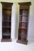 A near pair of contemporary hardwood open bookcases, 60 x 30 x 201cm and 60 x 35 x 201cm, the larger