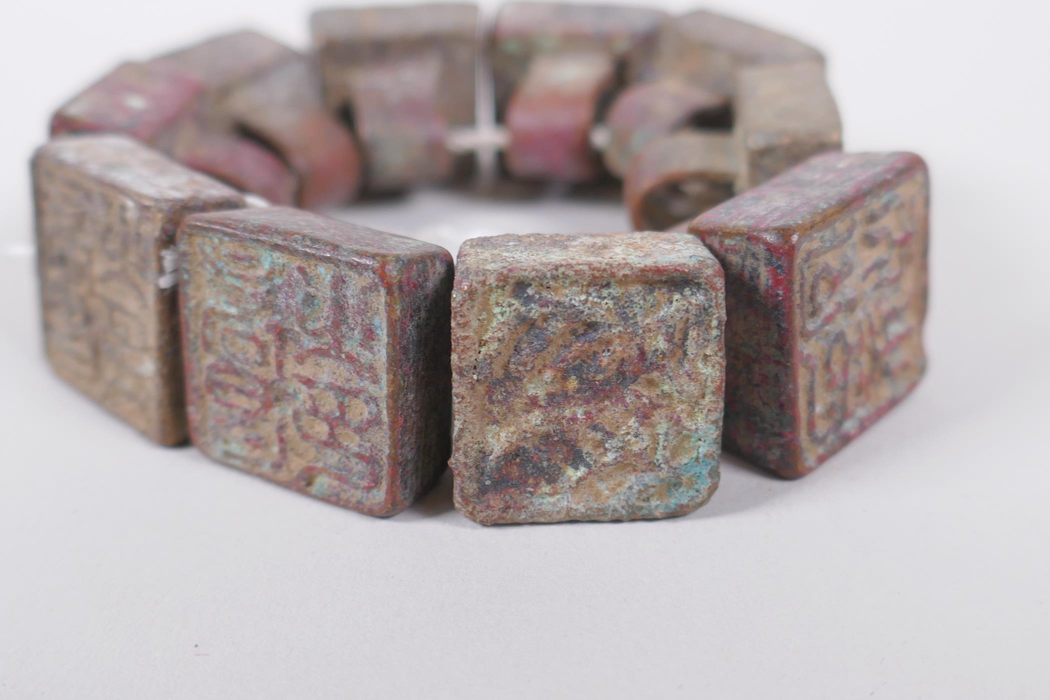 Ten archaic style Chinese bronze seals, 2 x 2cm - Image 2 of 5