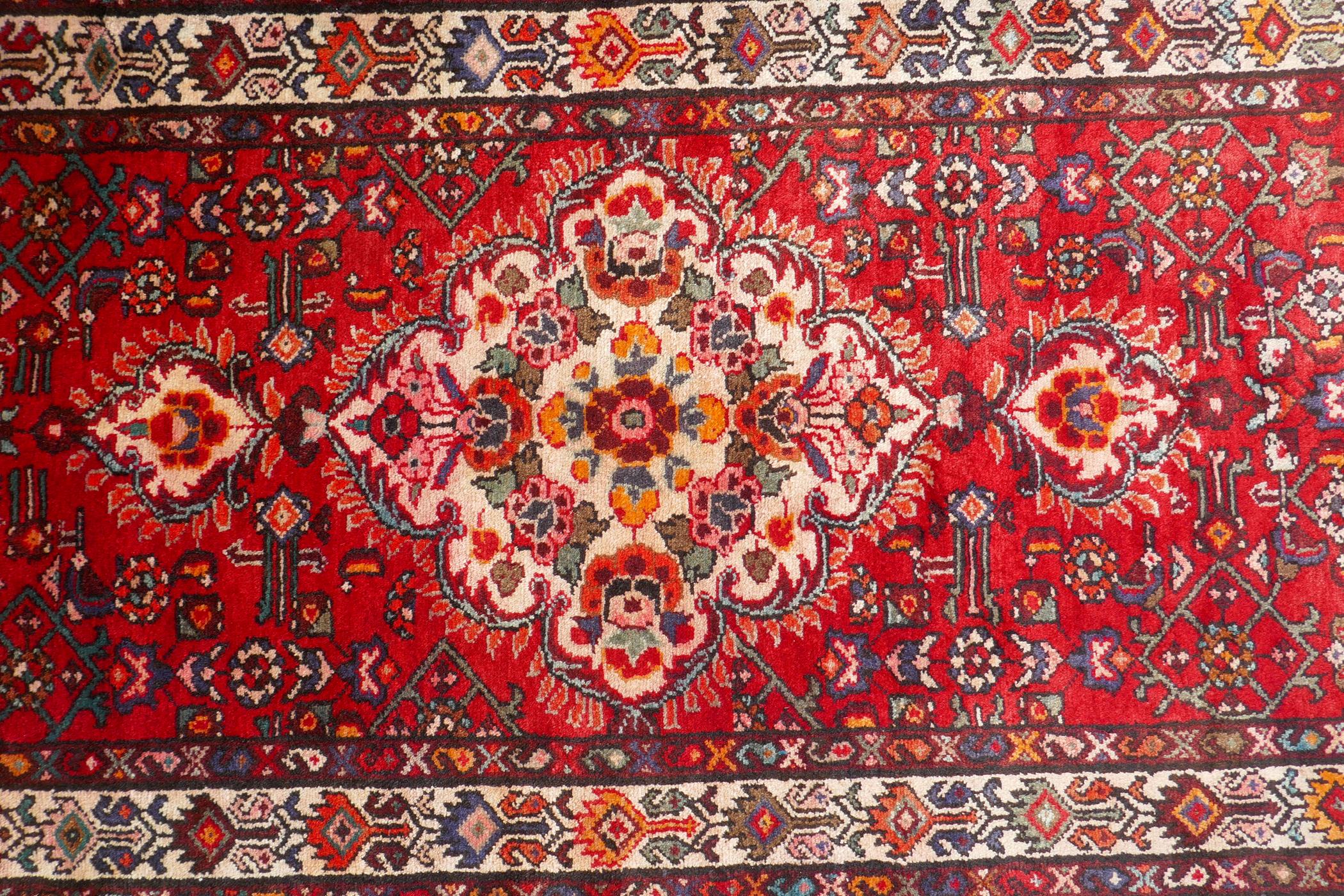 A rich red ground full heavy pile Iranian runner, AF, 104 x 365cm - Image 2 of 6