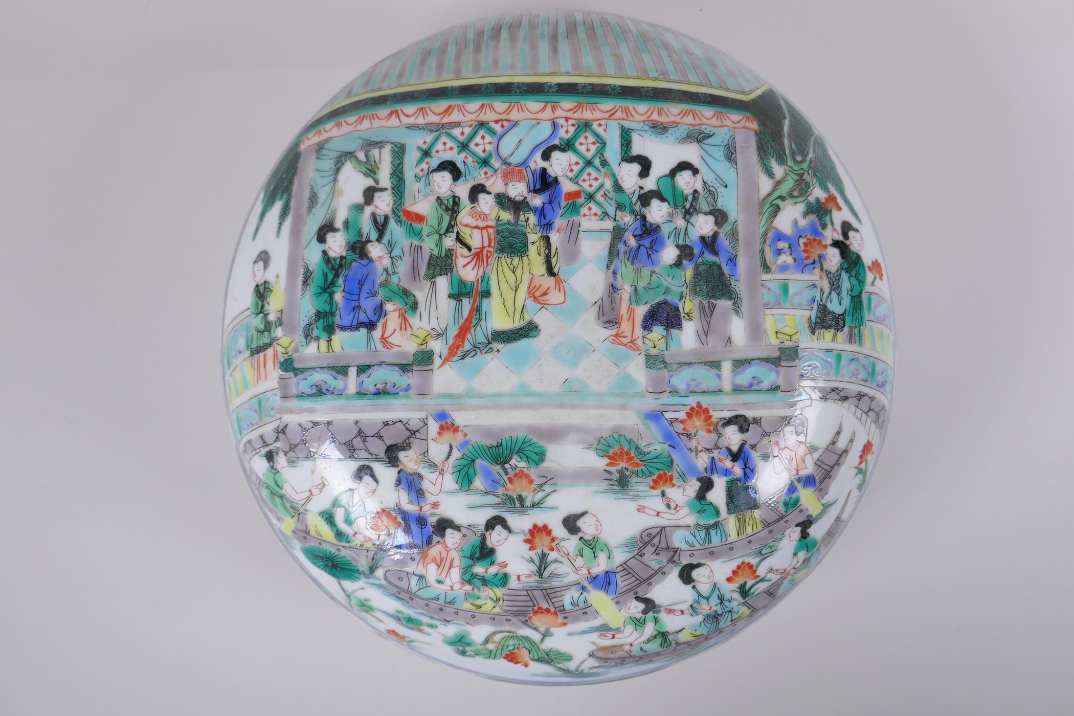 A late C19th/early C20th famille verte porcelain box and cover decorated with figures in a temple