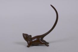 A Japanese style bronze okimono rat, mark to base, 8cm high