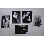 A collection of five black and white press photographs of David Bowie circa 1976, including one by