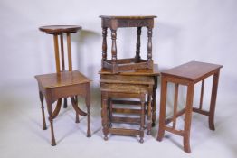 An Arts & Crafts oak dish top jardiniere stand (reduced), a joynt stool with elm top, nest of