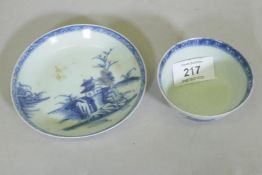 A Chinese export porcelain tea bowl and saucer from the Nanking Cargo, with accompanying certificate