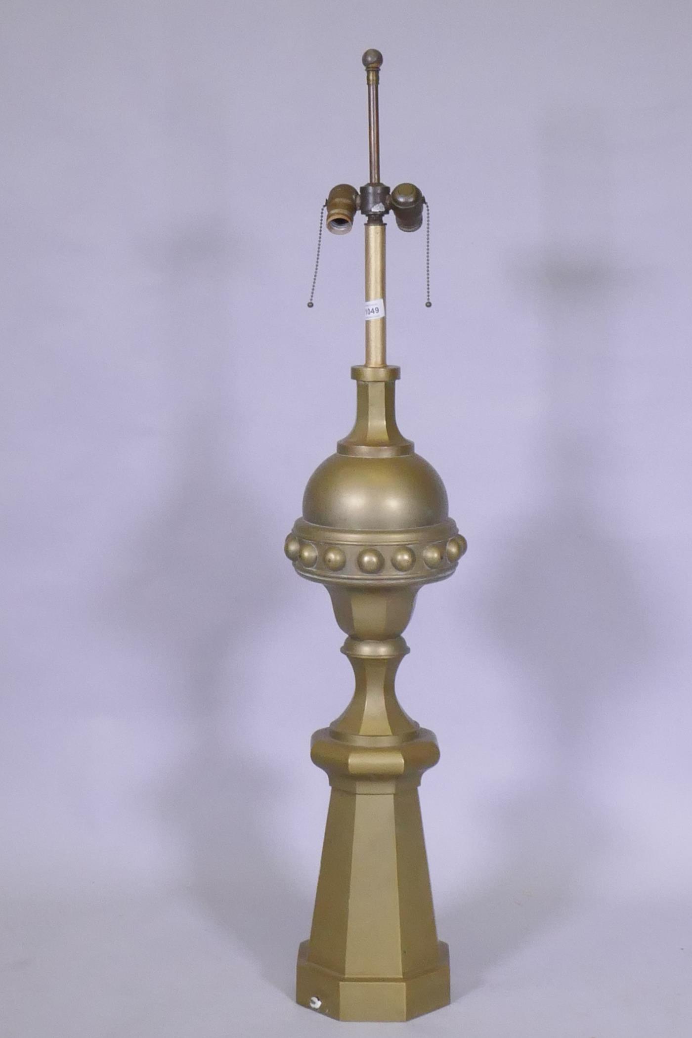 A brass lamp in the form of an architectural finial, 119cm high