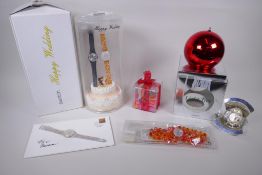 A collection of Retro Swatch watches including Happy Wedding 2000, Dear Mum 1999, Cupids Bow 2002,