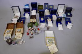 A collection of Halcyon Days, Bilston and Chelsea enamel pill boxes and bonbonnieres, National Trust