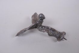 A cast white metal Spirit of Ecstasy hood ornament, 13cm high