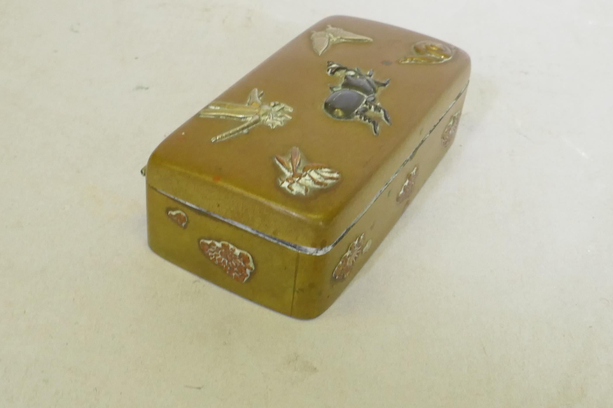 A Japanese Meiji period brass stamp box with raised multi-metal decoration of beetles, dragonfly and - Image 3 of 5