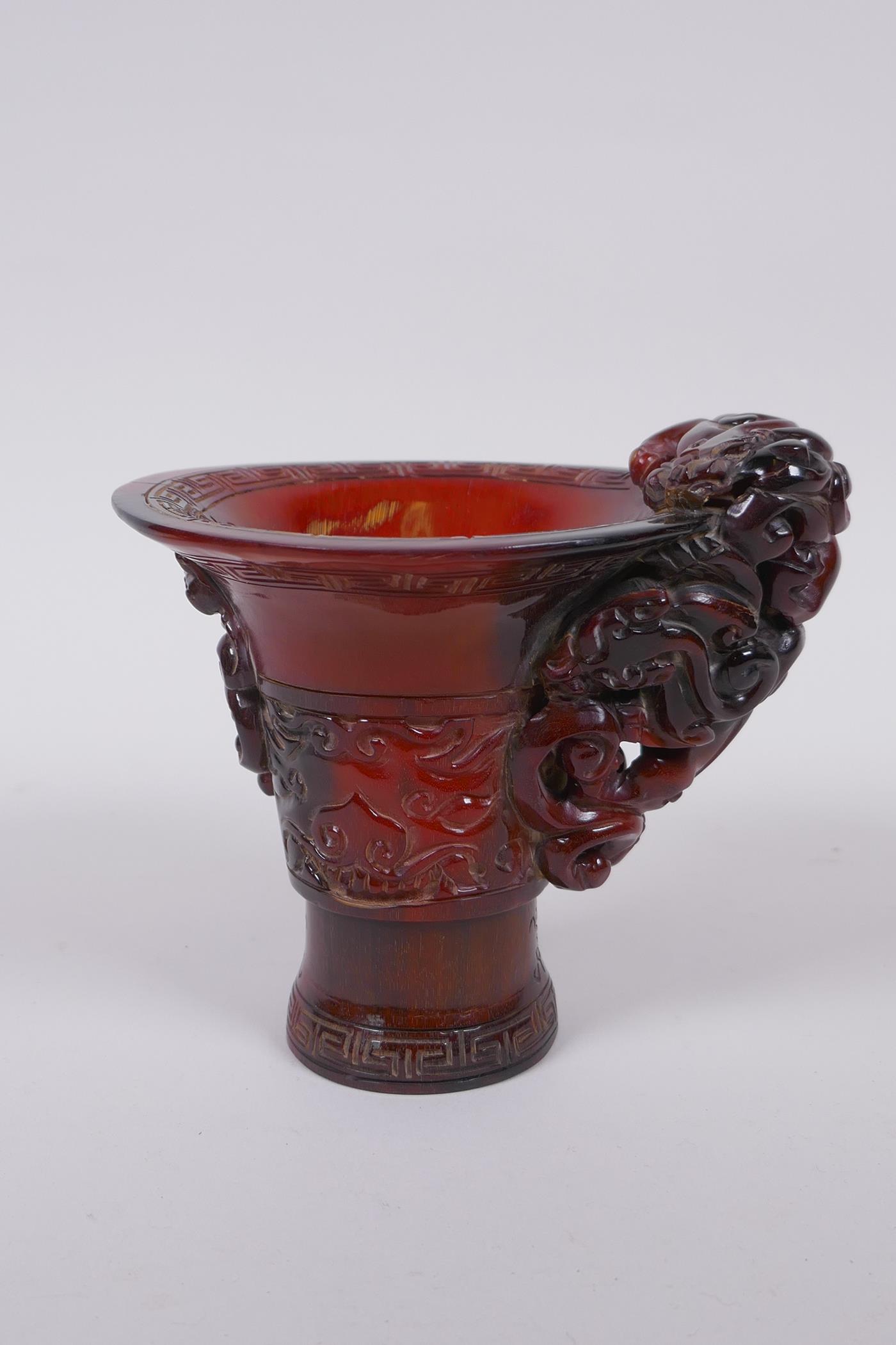 A Chinese horn libation cup with climbing kylin decoration, character mark to base, 12cm high - Image 3 of 5