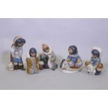 Five Lladro figures of Eskimos, No 12236 Frosty Outing, 28cm high; No 2361, Cold Weather Companions;