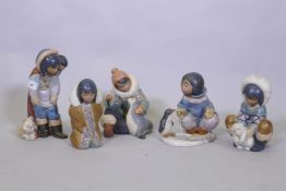 Five Lladro figures of Eskimos, No 12236 Frosty Outing, 28cm high; No 2361, Cold Weather Companions;