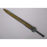 A Chinese archaic style bronze short sword with stylised gilt etched dragon decoration, 61cm long