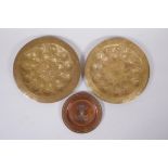 A pair of Indo Persian gilt brass trays with chased and hammered decoration, together with an