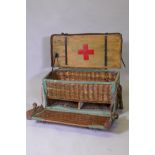 A WWI RAMC Field Surgical pannier, canvassed basket with leather and metal strapwork, 36 x 36 x 75cm