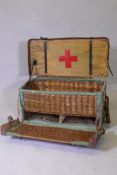 A WWI RAMC Field Surgical pannier, canvassed basket with leather and metal strapwork, 36 x 36 x 75cm