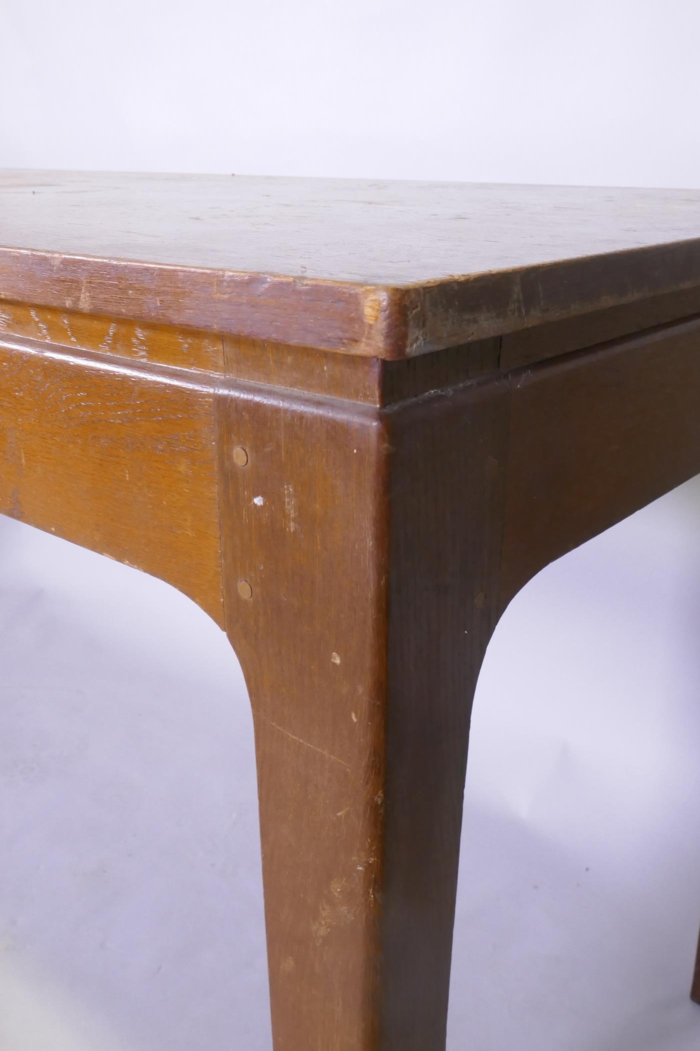 A mid century oak veneered serving table, raised on square tapering supports with pegged joints, - Image 5 of 5