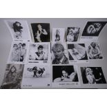 A quantity of black and white press and promotional photographs of musicians including Dolly Parton,