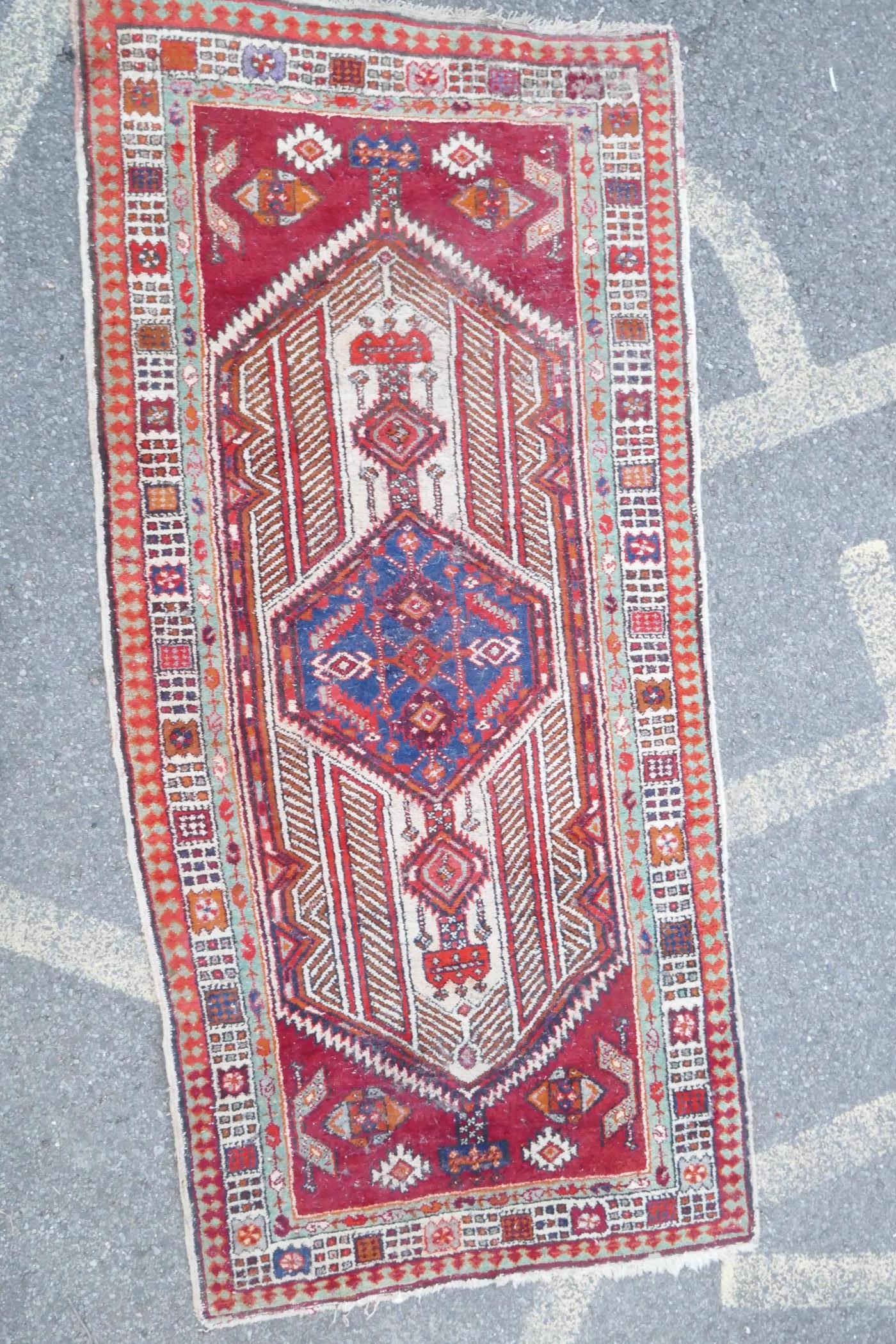 A red and blue ground flat weave runner, and a Persian red ground wool rug with a cream geometric - Image 7 of 8