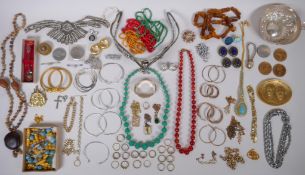 A quantity of vintage costume jewellery including a tiara, bangles, necklaces etc, together with a