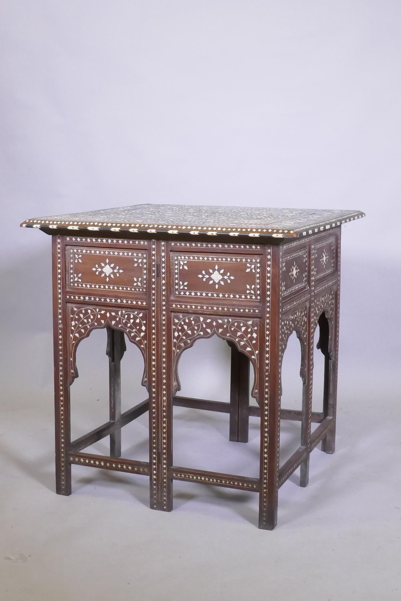 A C19th Moorish table with inlaid decoration and folding base, 61 x 61 x 63cm - Image 2 of 5