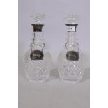A pair of crystal glass decanters with silver mounts, London 1971, A. Chick & Sons Ltd, with