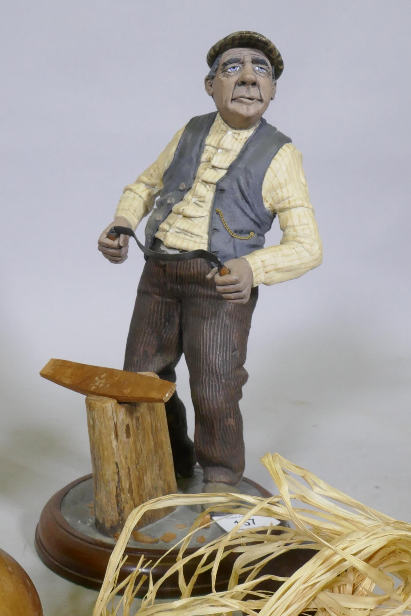 A collection of treen wood carvings of fruit, a composition model of a wood worker and a carved - Image 5 of 6