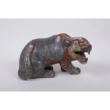 A Chinese carved soapstone tiger, 23cm long