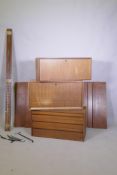 A mid century Danish teak System Cado/Royal System by Poul Cadovius, comprising three units, five