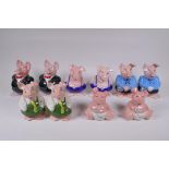 Two sets of five Wade NatWest ceramic piggy banks, largest 18cm high