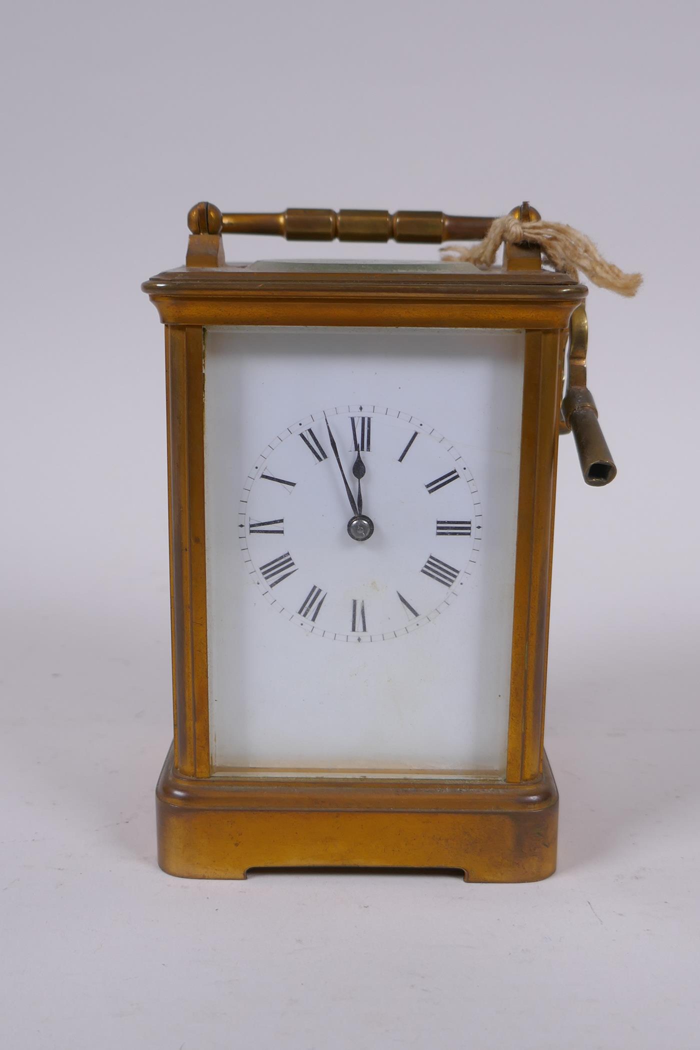An early C20th French brass carriage clock striking on a gong by Richard & Cie,9 x 8cm, 14cm high