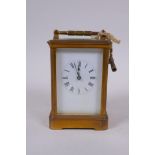An early C20th French brass carriage clock striking on a gong by Richard & Cie,9 x 8cm, 14cm high