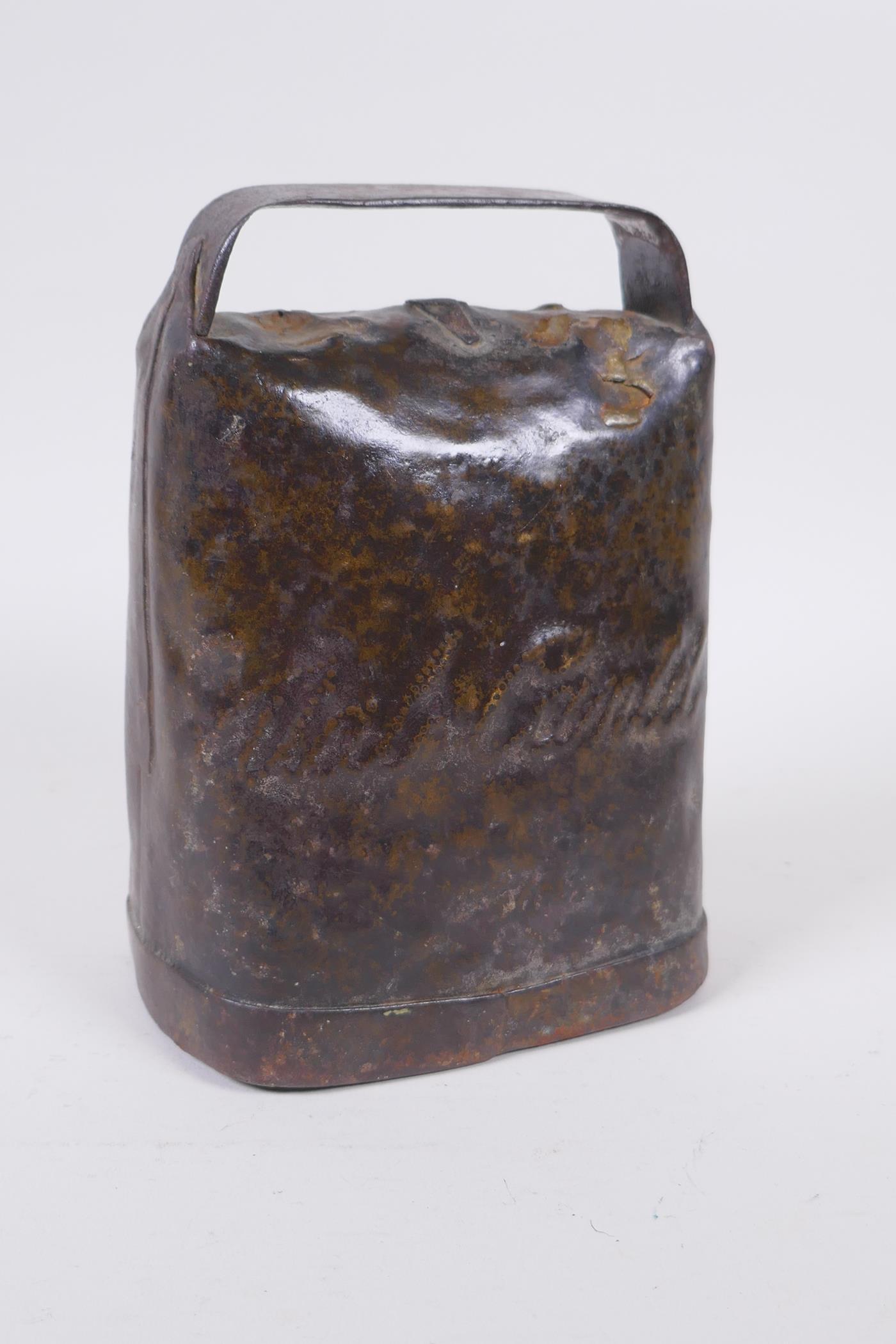 An antique continental cow bell, 14 x 19cm