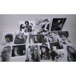 A quantity of black and white press and promotional photographs relating to films, including The