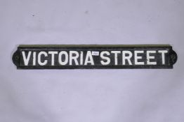 An antique cast iron street sign, Victoria Street, 90cm long