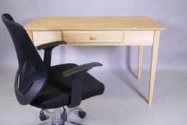 A contemporary beech wood office desk with slide, and an office chair, desk dismantles, 120 x 62 x