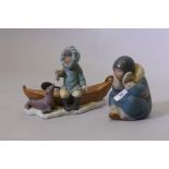 A Lladro figure No 12260, Arctic Friends, 18cm high, and No 2158, Esquimalito Ensimismada, with