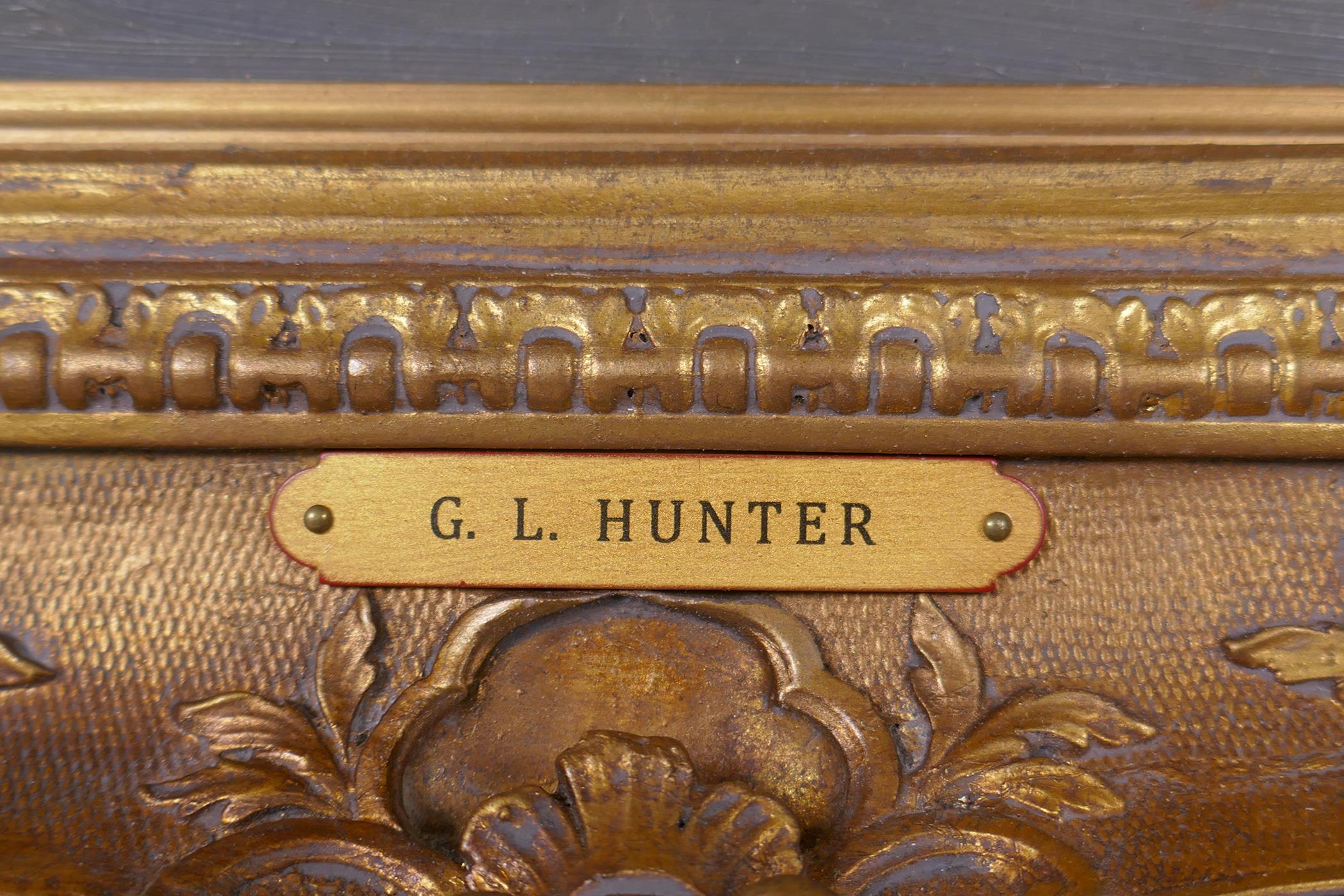 View across a landscape, inscribed on frame plaque G. L. Hunter, early C20th oil on board, in a gilt - Image 3 of 4