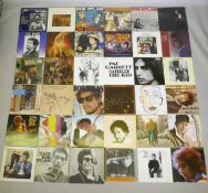 A collection of Bob Dylan vinyl LPs, including Desire, Street Legend, Hard Times, Slow Train Coming,