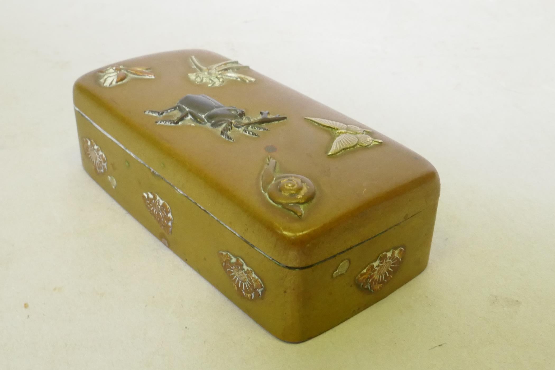 A Japanese Meiji period brass stamp box with raised multi-metal decoration of beetles, dragonfly and - Image 4 of 5