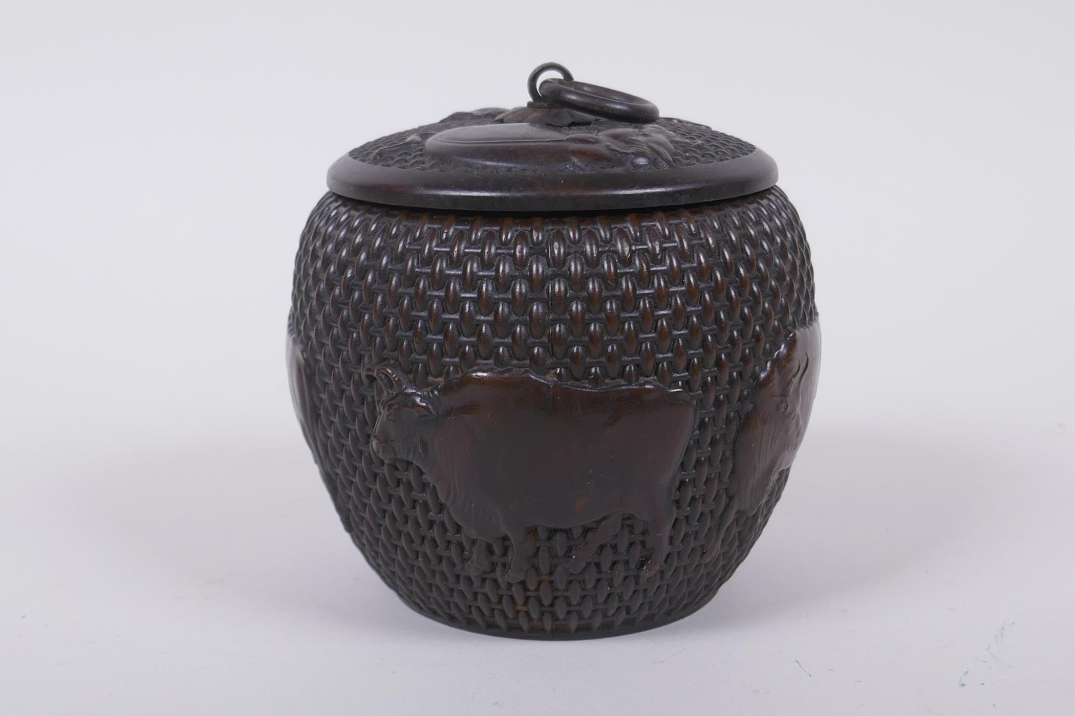 A Chinese bronze jar and cover of basket form, with water buffalo decoration, impressed Xuande 4 - Image 4 of 7